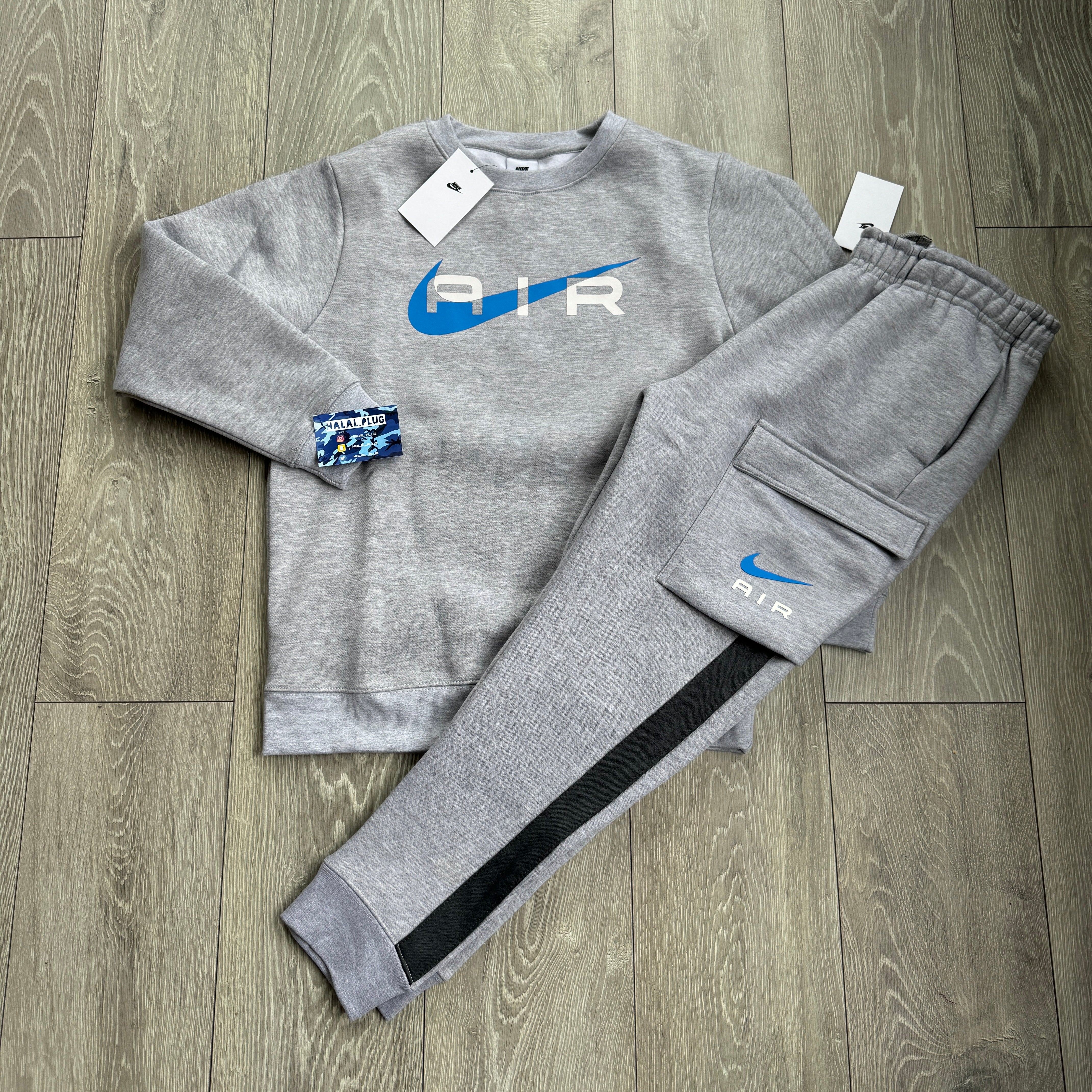 grey and blue nike sweatsuit