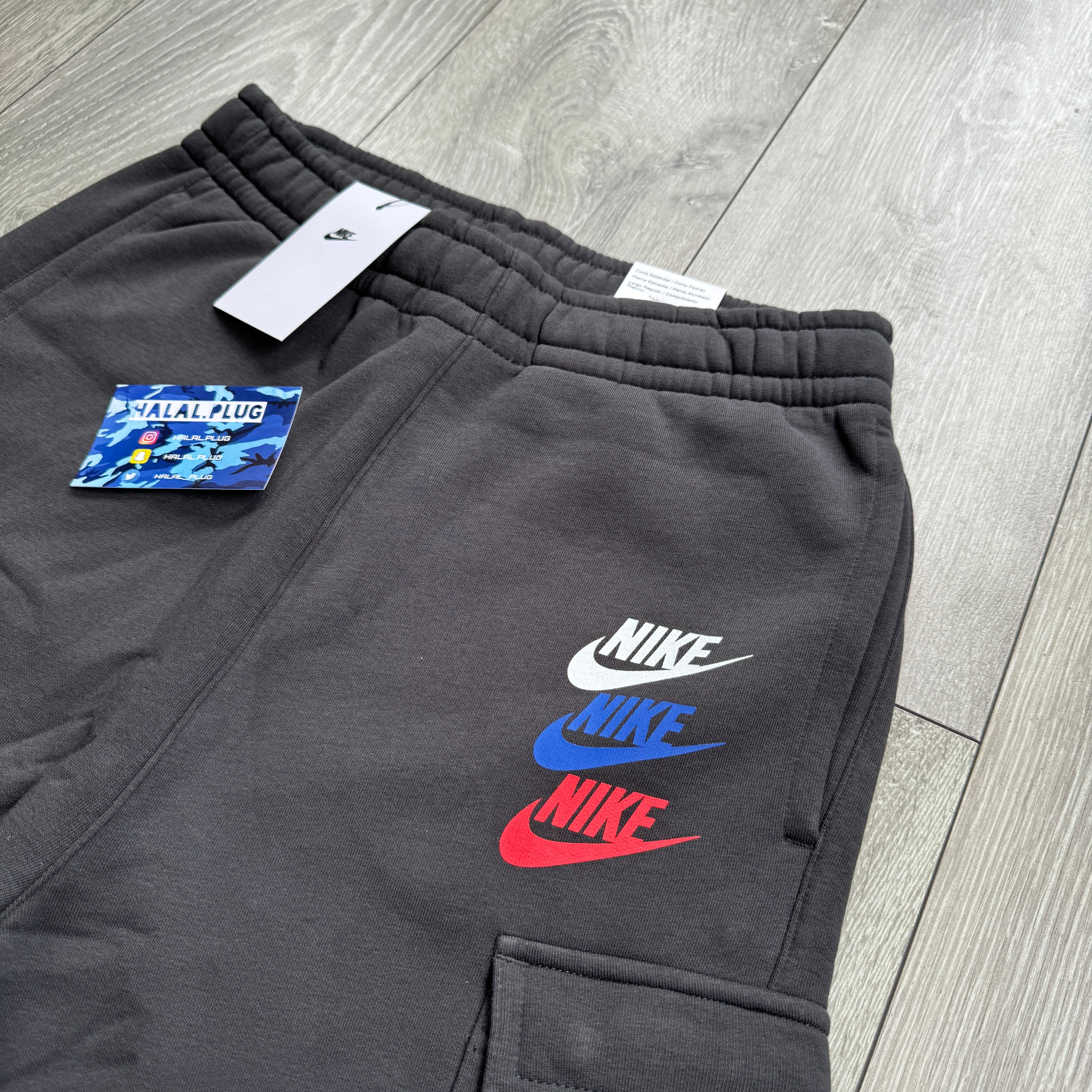 black nike joggers red tick